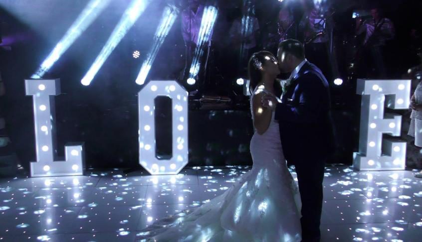 MR & MRS letters and dancefloor